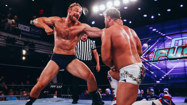 Timothy Thatcher delivers a punch to an opponent